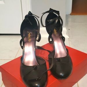 Frederick's black heels